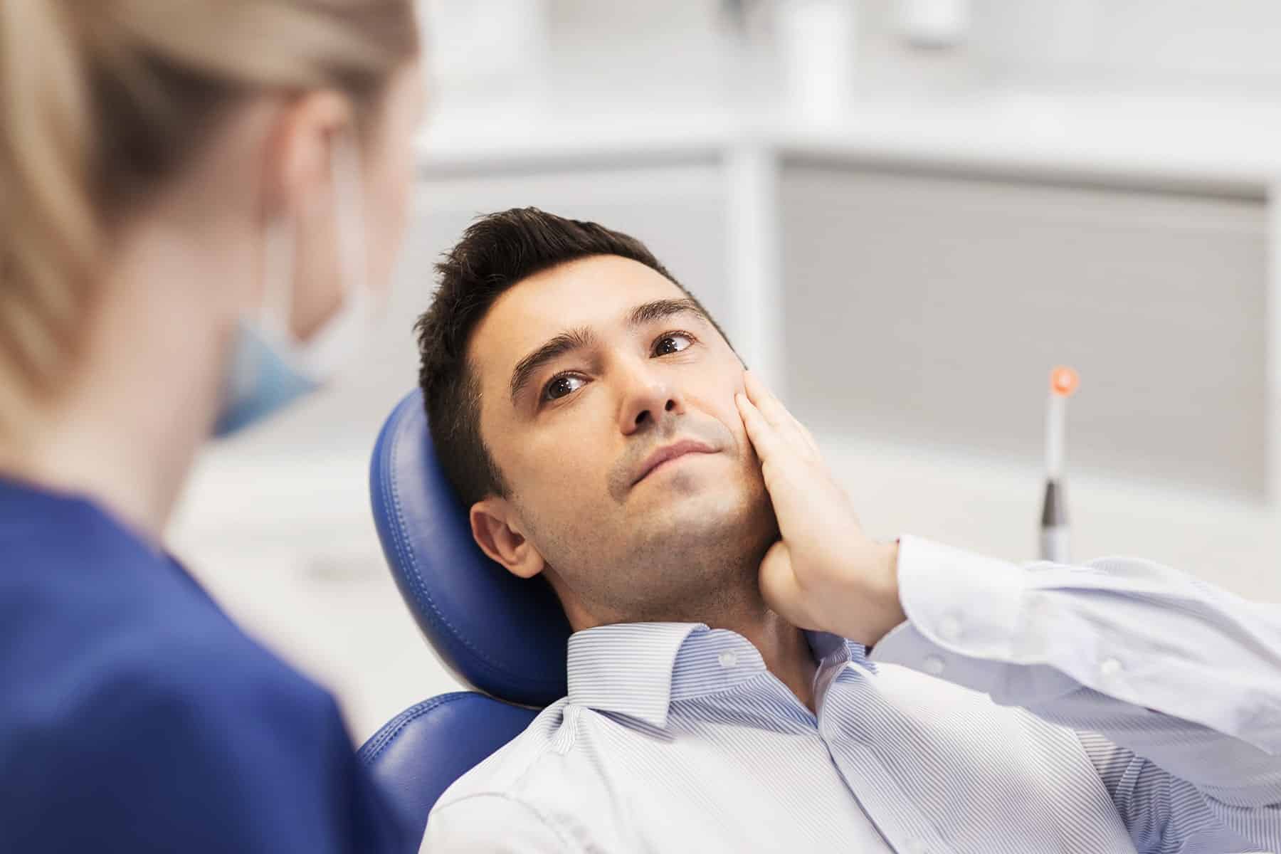 Man getting dental repairs in Cumming, GA