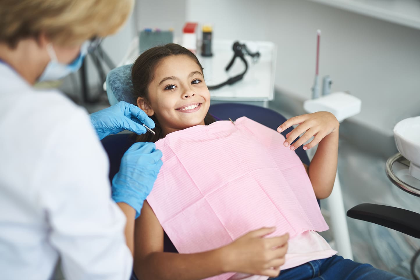 pediatric dental patient smiling during teeth cleaning appointment at all smiles family and cosmetic dentistry in cumming georgia