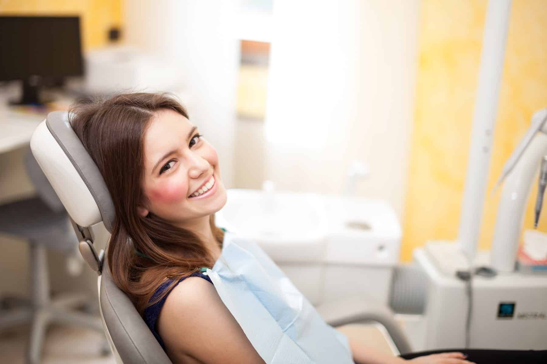 Woman getting a teeth exam in Cumming, GA